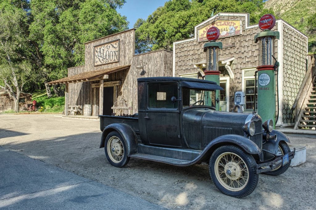 vintage car in front of saloon at rancho deluxe