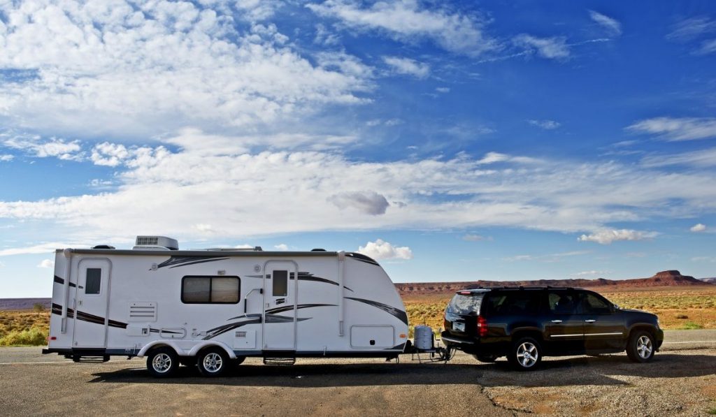 RV trailer on the road looking for an outdoor trailer storage facility