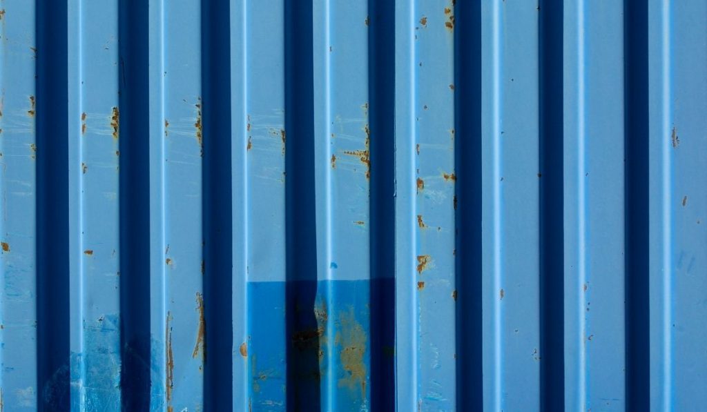 rusted shipping containers